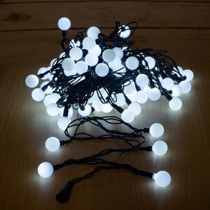 Светодиодная гирлянда Мультишарики 25 мм 70 холодных белых LED ламп 10 м, черный ПВХ, соединяемая, IP44 Snowhouse фото 6