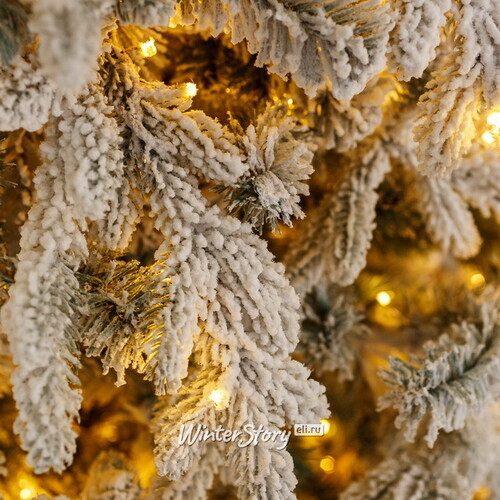 Искусственная елка с лампочками Россо Премиум заснеженная 210 см, 1030 теплых белых ламп, ЛИТАЯ + ПВХ GREEN TREES
