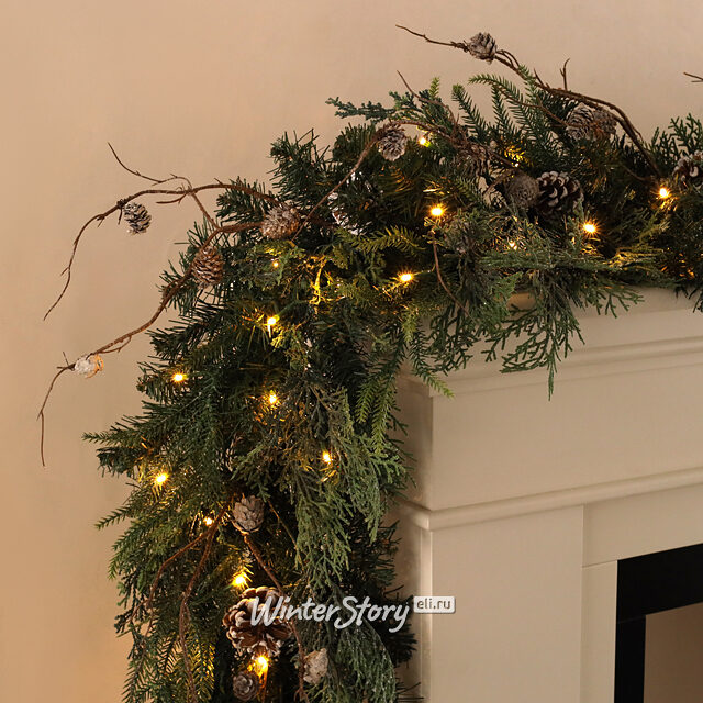 Хвойная гирлянда с лампочками Rago Nature 183 см с шишками, 50 теплых белых ламп, на батарейках, ЛИТАЯ + ПВХ Nordic Collection