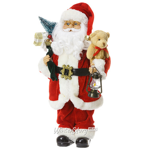 Санта в красном кафтане с медвежонком и мешком подарков 40 см Eggl
