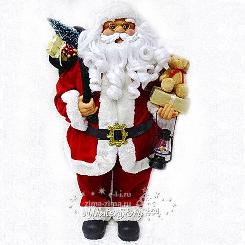 Санта в красном кафтане с медвежонком и мешком подарков 60 см Eggl