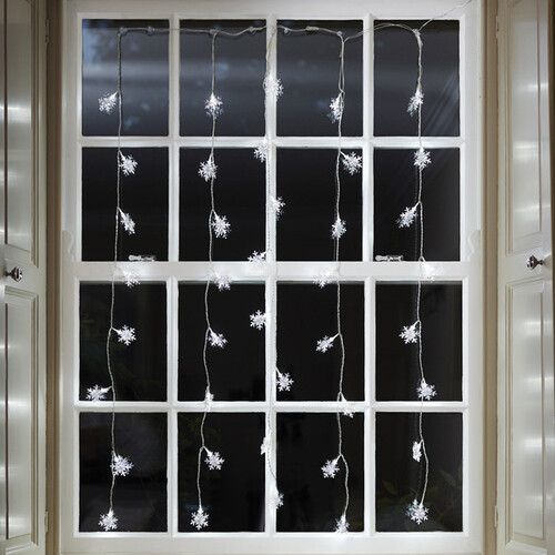 Гирлянда - занавес на окно Снежинки 1.2*1 м, 64 холодных белых LED ламп, прозрачный ПВХ, IP20 Kaemingk