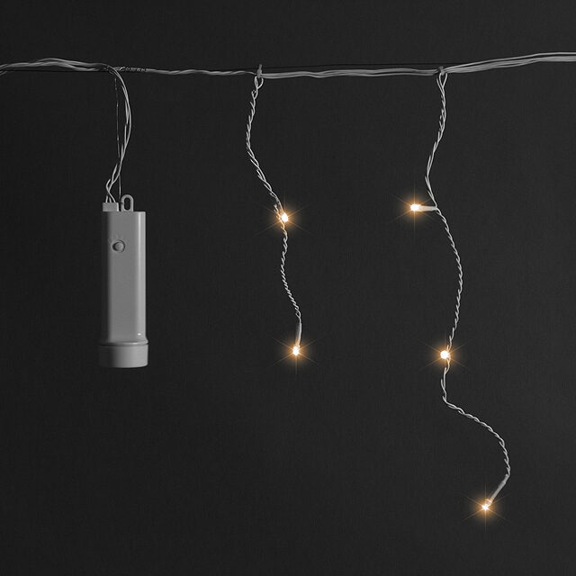 Светодиодная гирлянда Сосульки на батарейке 7*0.5 м, 192 теплых белых LED ламп, белый ПВХ, контроллер, таймер, IP44 Kaemingk (Кейминг)