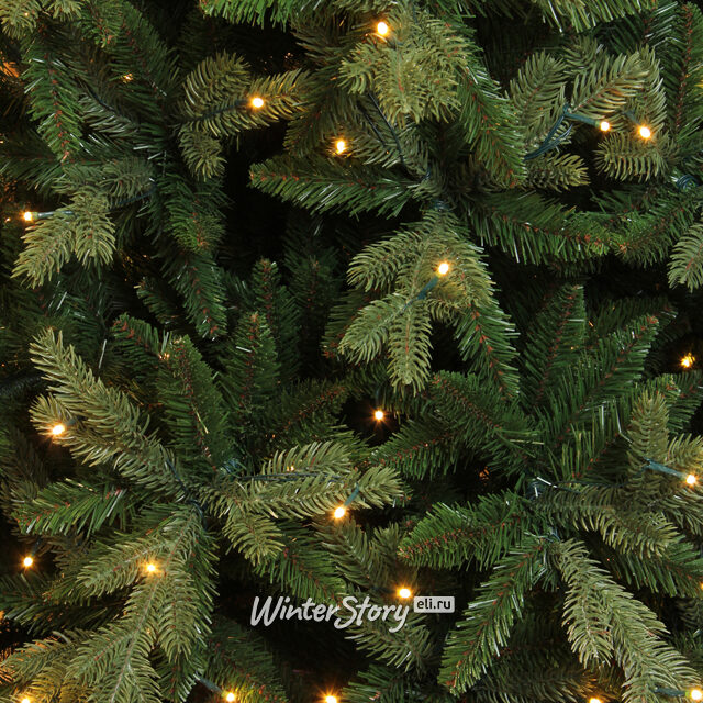 Пристенная искусственная сосна с лампочками Изумрудная 245 см, 216 теплых белых ламп, ЛИТАЯ + ПВХ Triumph Tree