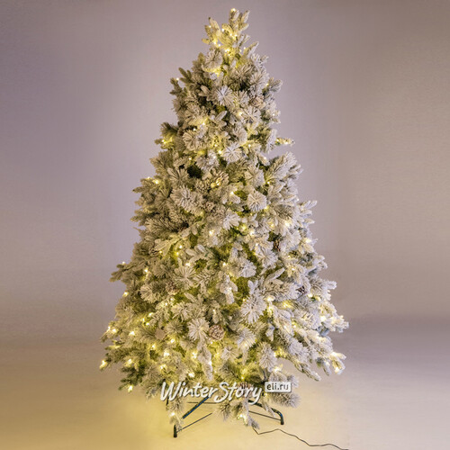 Искусственная елка с лампочками Принцесса льда заснеженная с шишками 155 cм, 230 теплых белых ламп, ЛИТАЯ + ПВХ + Леска Царь Елка