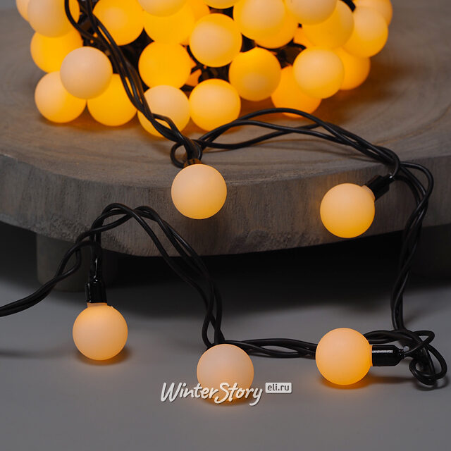 Светодиодная гирлянда Мультишарики 25 мм 100 желтых LED ламп 15 м, черный ПВХ, соединяемая, IP44 Snowhouse