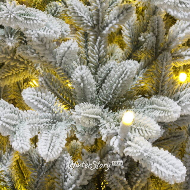 Искусственная елка с лампочками Веста заснеженная 230 см, теплые белые лампы, ЛИТАЯ 100% ElkaDe