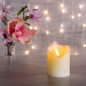 Светодиодная свеча с имитацией пламени Стелла 9 см кремовая восковая на батарейках Kaemingk фото 1