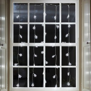 Гирлянда - занавес на окно Снежинки 1.2*1 м, 64 холодных белых LED ламп, прозрачный ПВХ, IP20