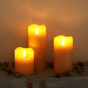 Светодиодная свеча с имитацией пламени Стелла 9 см миндальная восковая, на батарейках, таймер Kaemingk фото 4