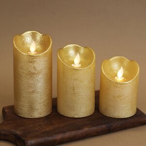 Светодиодная свеча Живое Пламя 10 см золотая восковая на батарейках, таймер Kaemingk фото 4