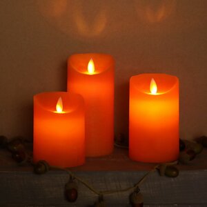 Светодиодная свеча с имитацией пламени 12.5 см, оранжевая восковая, батарейка Peha фото 5