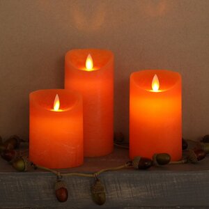 Светодиодная свеча с имитацией пламени 12.5 см, оранжевая восковая, батарейка Peha фото 4