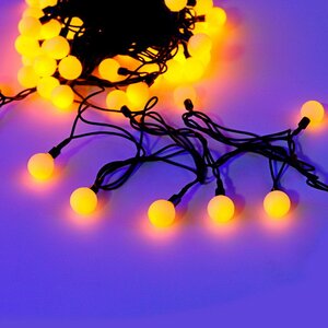 Светодиодная гирлянда Мультишарики 25 мм 70 желтых LED ламп 10 м, черный ПВХ, соединяемая, IP44 Snowhouse фото 1