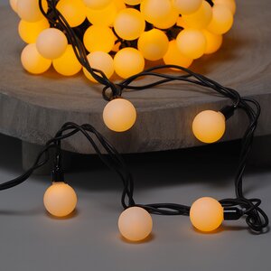 Светодиодная гирлянда Мультишарики 25 мм 100 желтых LED ламп 15 м, черный ПВХ, соединяемая, IP44 Snowhouse фото 2