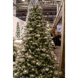 Искусственная елка с гирляндой Шеффилд заснеженная 228 см, 650 теплых белых ламп, ЛИТАЯ + ПВХ National Tree Company фото 2