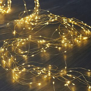 Гирлянда на елку 1 м Лучи Капельки Росы, 10 нитей, 100 экстра теплых белых мини LED ламп, золотая проволока, IP44 Koopman фото 1