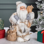 Санта в мохнатой шубе с подарками и лыжами 25 см