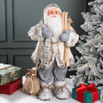 Санта в овечьей шубе с подарками и лыжами 61 см